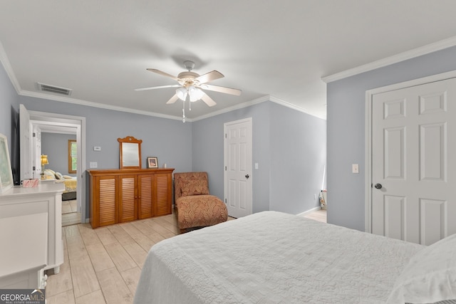 bedroom with ceiling fan, light hardwood / wood-style flooring, and ornamental molding