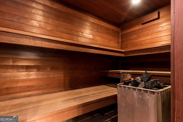 view of sauna / steam room featuring wood ceiling