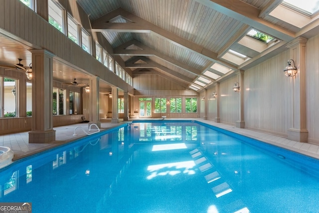 view of pool with a patio and ceiling fan