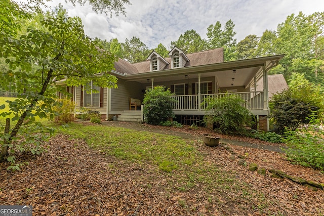 back of house with a porch