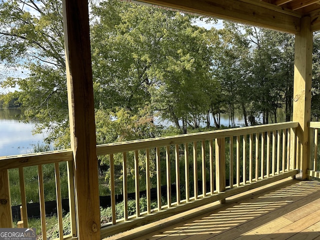 deck featuring a water view