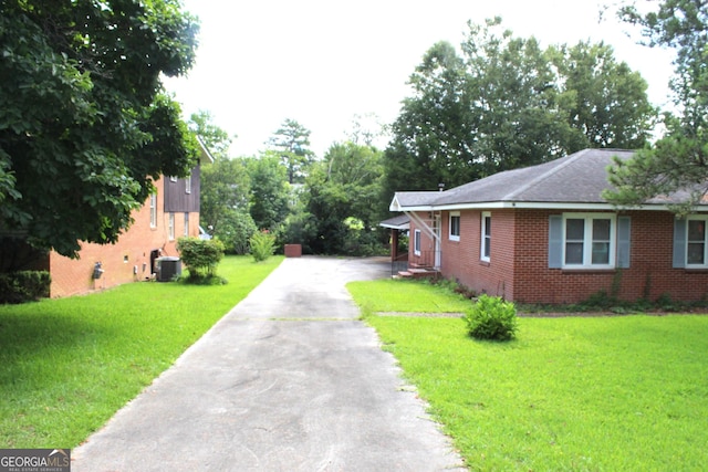 view of yard featuring central AC