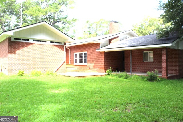 view of home's exterior featuring a yard and cooling unit