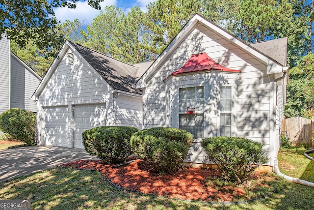 view of front of property featuring a garage