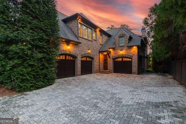 view of front of property with a garage