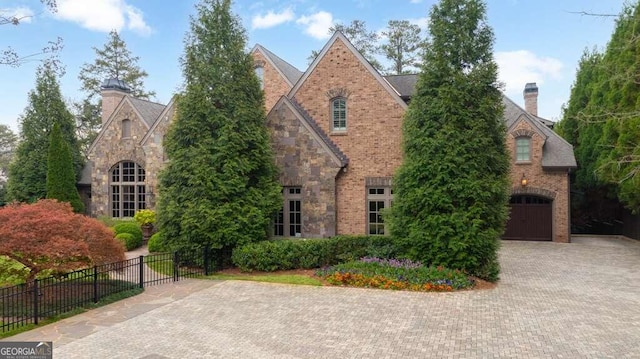 tudor house with a garage