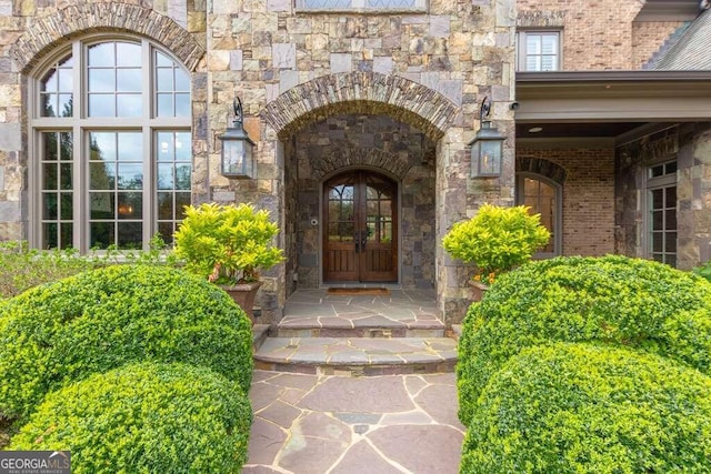 doorway to property with french doors