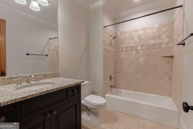 full bathroom with tile patterned flooring, toilet, vanity, ornamental molding, and tiled shower / bath