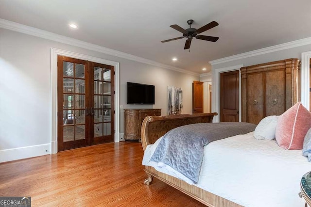 bedroom with french doors, hardwood / wood-style floors, ornamental molding, and ceiling fan