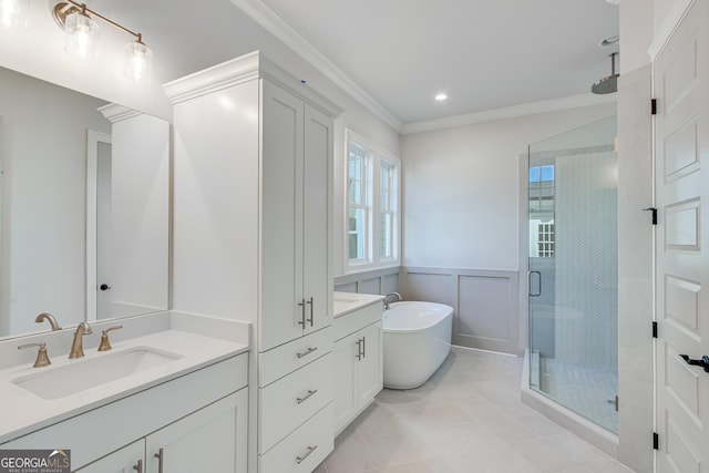 bathroom with tile patterned floors, vanity, crown molding, and independent shower and bath