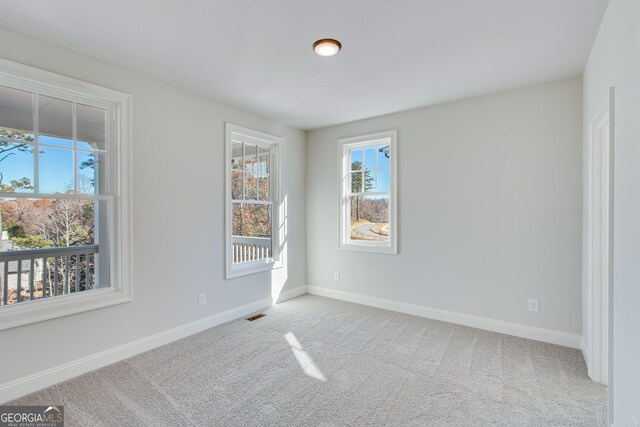 view of carpeted spare room