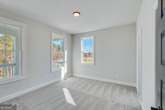 view of carpeted spare room