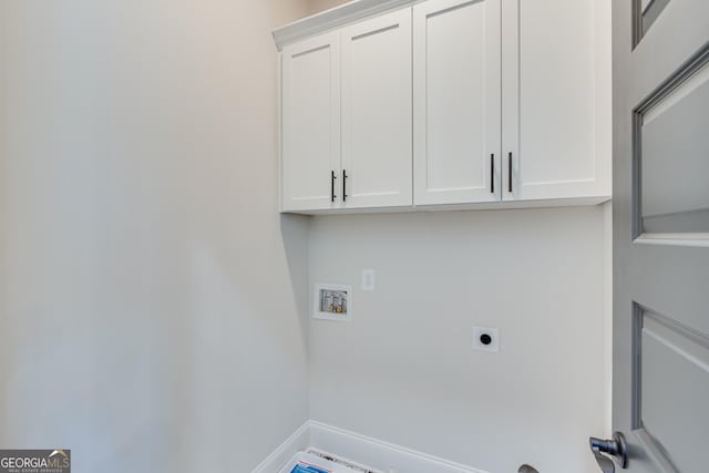 laundry area featuring washer hookup, hookup for an electric dryer, and cabinets