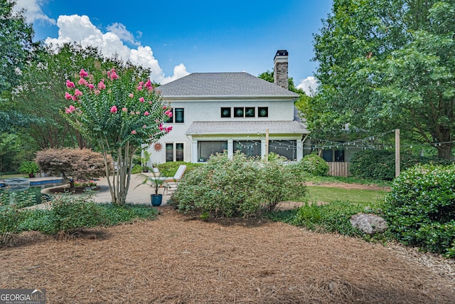 view of front of house featuring a patio