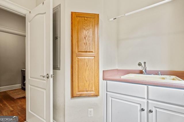 bathroom featuring hardwood / wood-style flooring and vanity