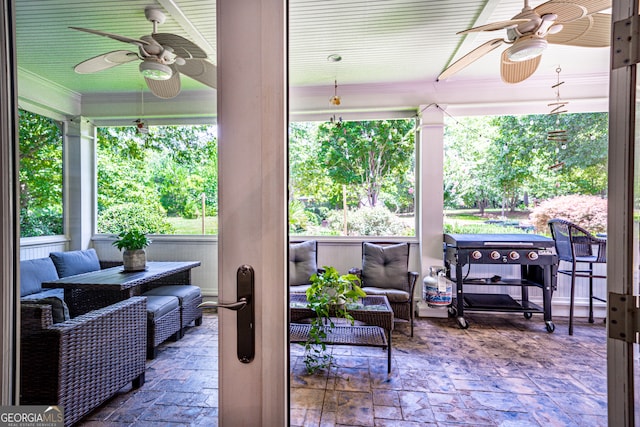 view of patio featuring an outdoor living space and ceiling fan