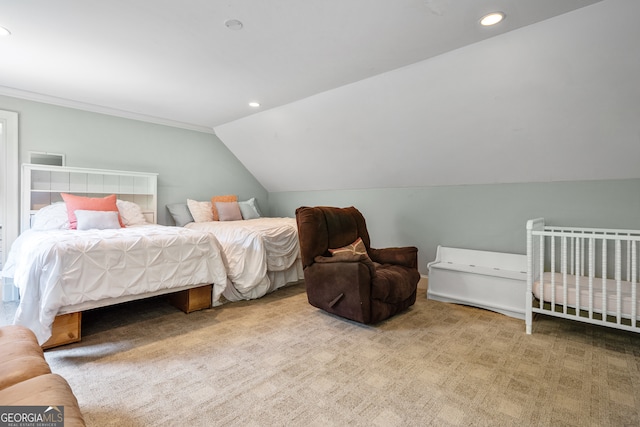 carpeted bedroom featuring vaulted ceiling