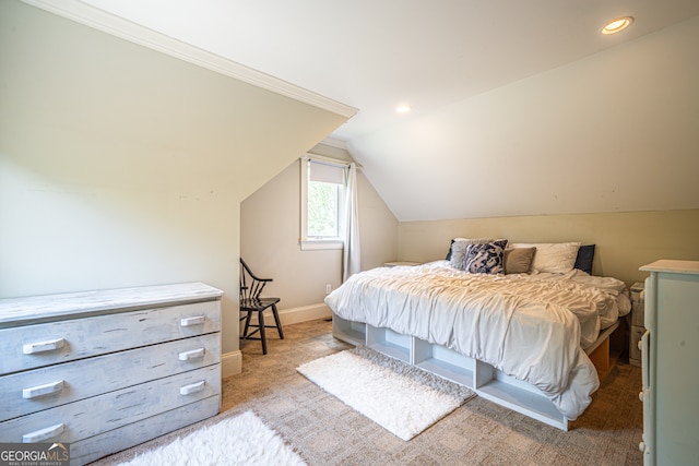 carpeted bedroom featuring vaulted ceiling