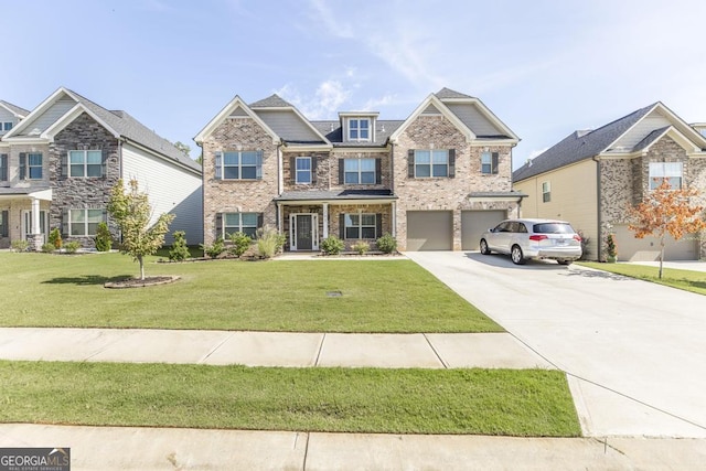 view of front of home with a garage and a front lawn