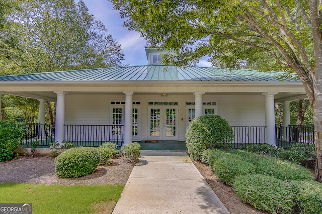 doorway to property with a porch