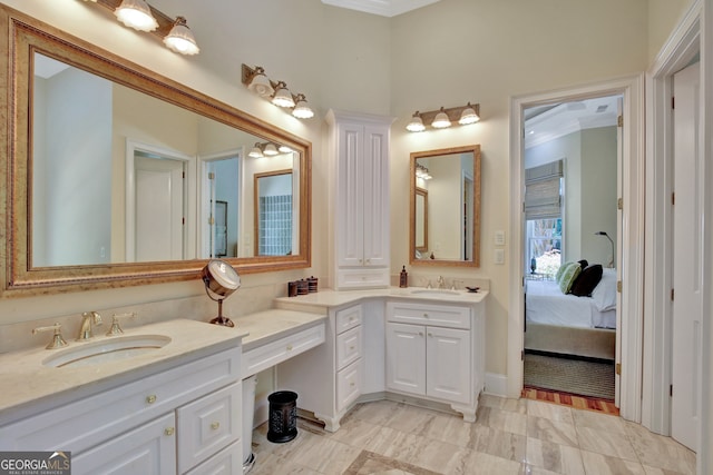 bathroom featuring vanity and crown molding