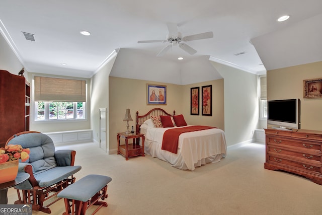 carpeted bedroom with ornamental molding and ceiling fan