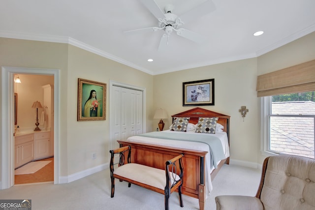 bedroom with ornamental molding, light colored carpet, a closet, and ceiling fan