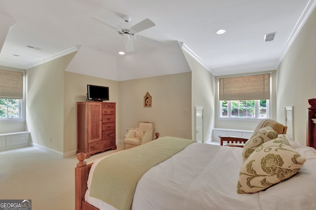 bedroom featuring ornamental molding, multiple windows, light colored carpet, and ceiling fan