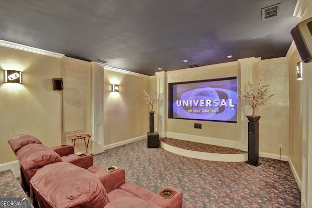 carpeted cinema featuring ornamental molding