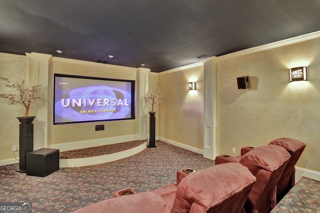 cinema with ornamental molding and carpet floors