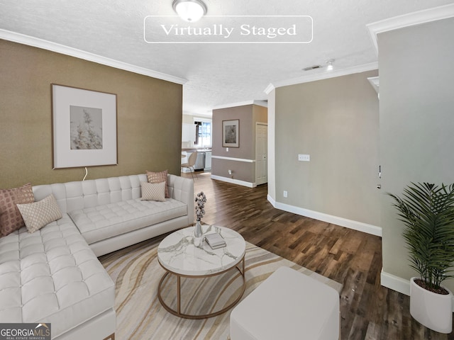 living room with ornamental molding, a textured ceiling, and dark wood-type flooring