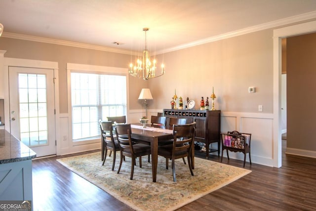 dining space with a chandelier, crown molding, plenty of natural light, and dark wood-type flooring