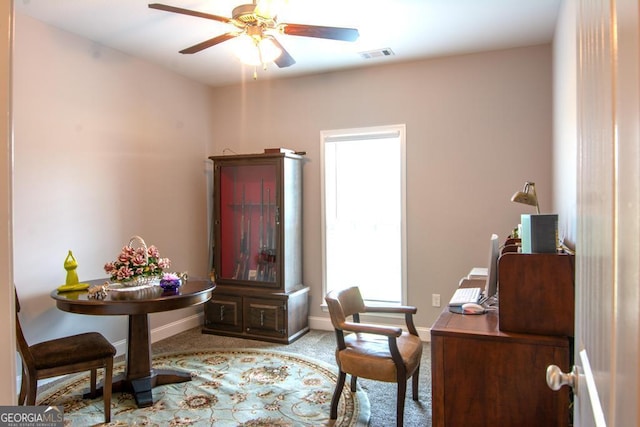 office space with ceiling fan and carpet flooring