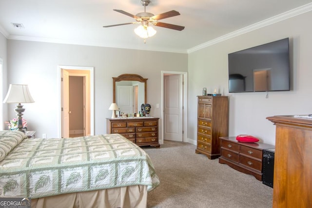 bedroom with carpet floors, ceiling fan, and crown molding