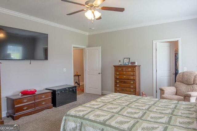 bedroom featuring carpet, crown molding, and ceiling fan