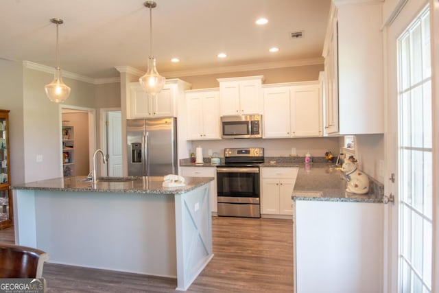 kitchen featuring sink, appliances with stainless steel finishes, dark wood-type flooring, and white cabinets