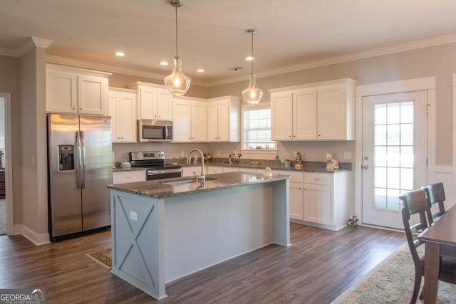 kitchen featuring white cabinets, dark hardwood / wood-style floors, a healthy amount of sunlight, and appliances with stainless steel finishes