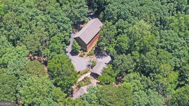 aerial view featuring a forest view