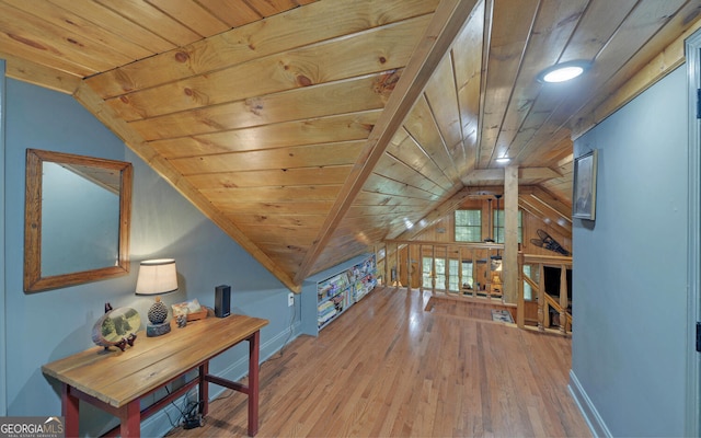 bonus room featuring lofted ceiling, hardwood / wood-style floors, and wooden ceiling