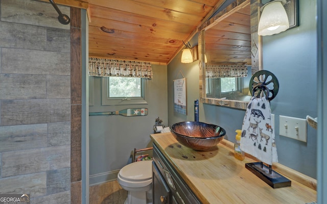 bathroom with lofted ceiling, toilet, a shower, wood ceiling, and vanity