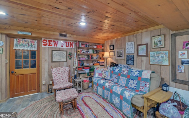 living room featuring visible vents, recessed lighting, wood finished floors, wood walls, and wood ceiling
