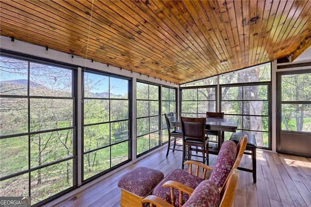 sunroom with wood ceiling