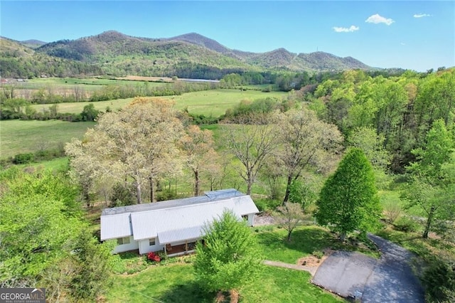 drone / aerial view featuring a mountain view