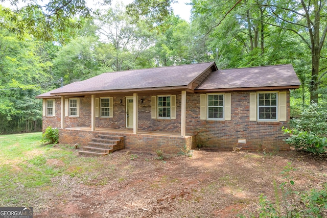 ranch-style house featuring a porch