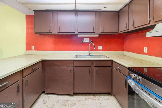 kitchen featuring sink and stainless steel range with electric cooktop