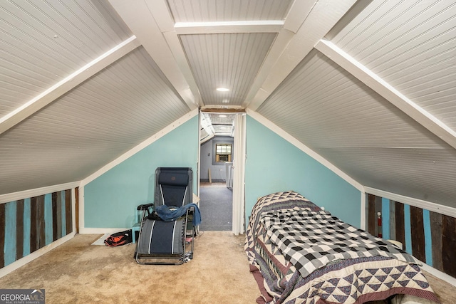 bedroom with carpet and lofted ceiling