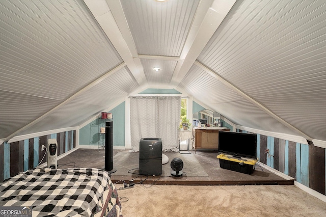 bedroom with carpet and lofted ceiling