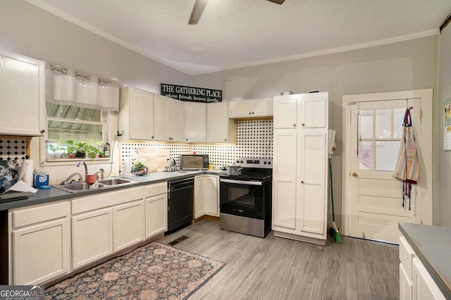 kitchen featuring sink, light hardwood / wood-style flooring, crown molding, decorative backsplash, and black appliances