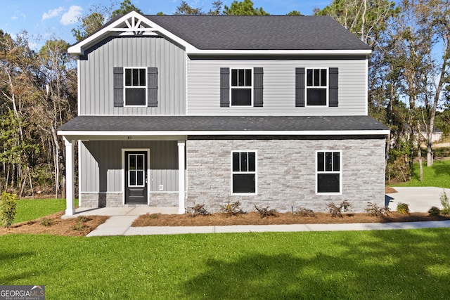 view of front of home with a front lawn and a porch