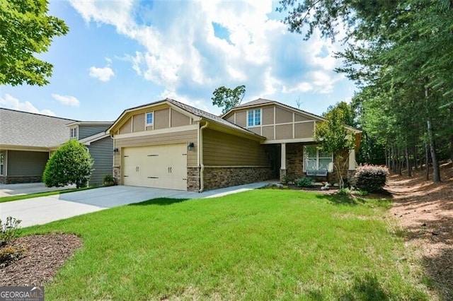 view of front of home with a front lawn and a garage